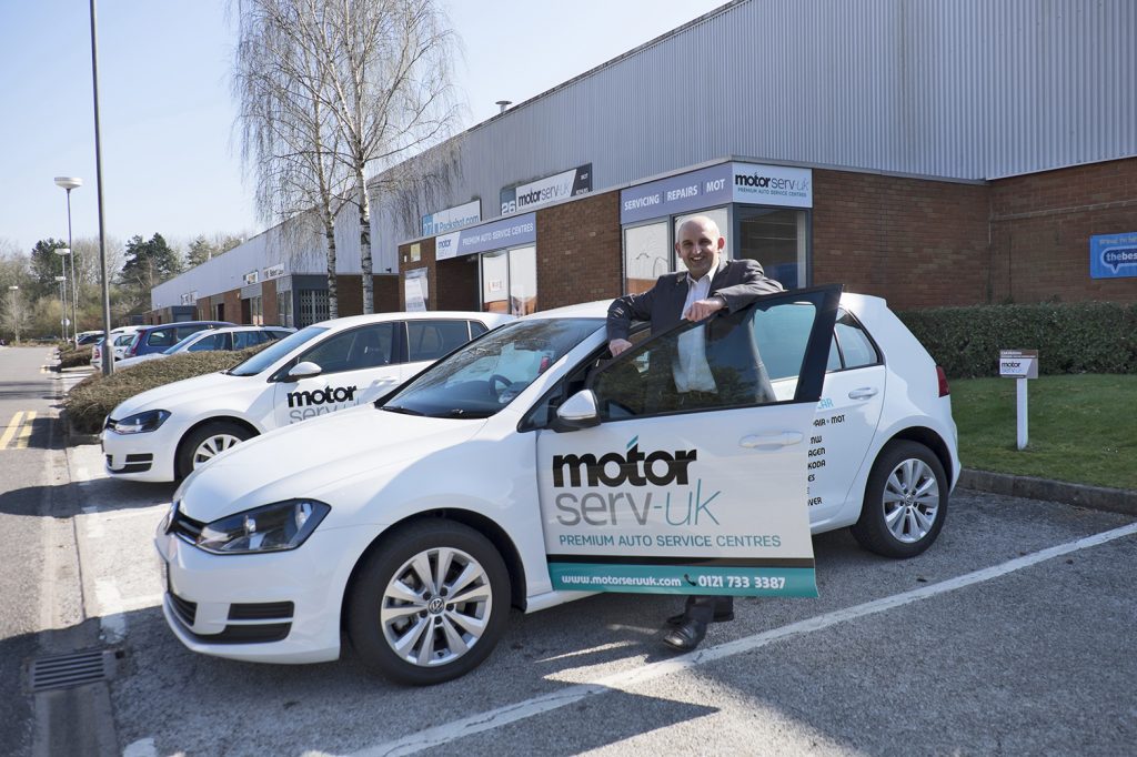 Automotive boss Kam Saleem outside his Motorserv business