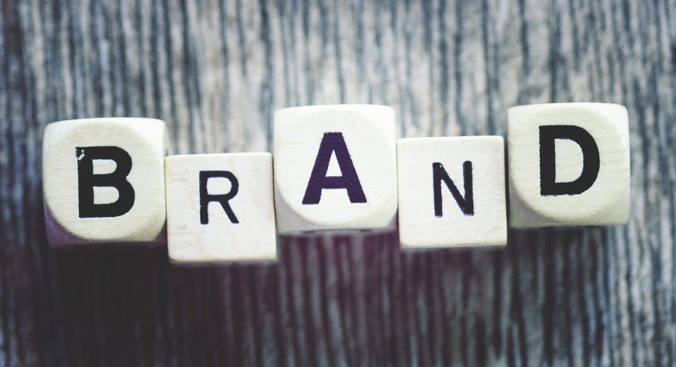 brand-spelled-out-on-wooden-blocks-2022-11-10-21-54-58-utc How Being Unbranded Is Costing You Money